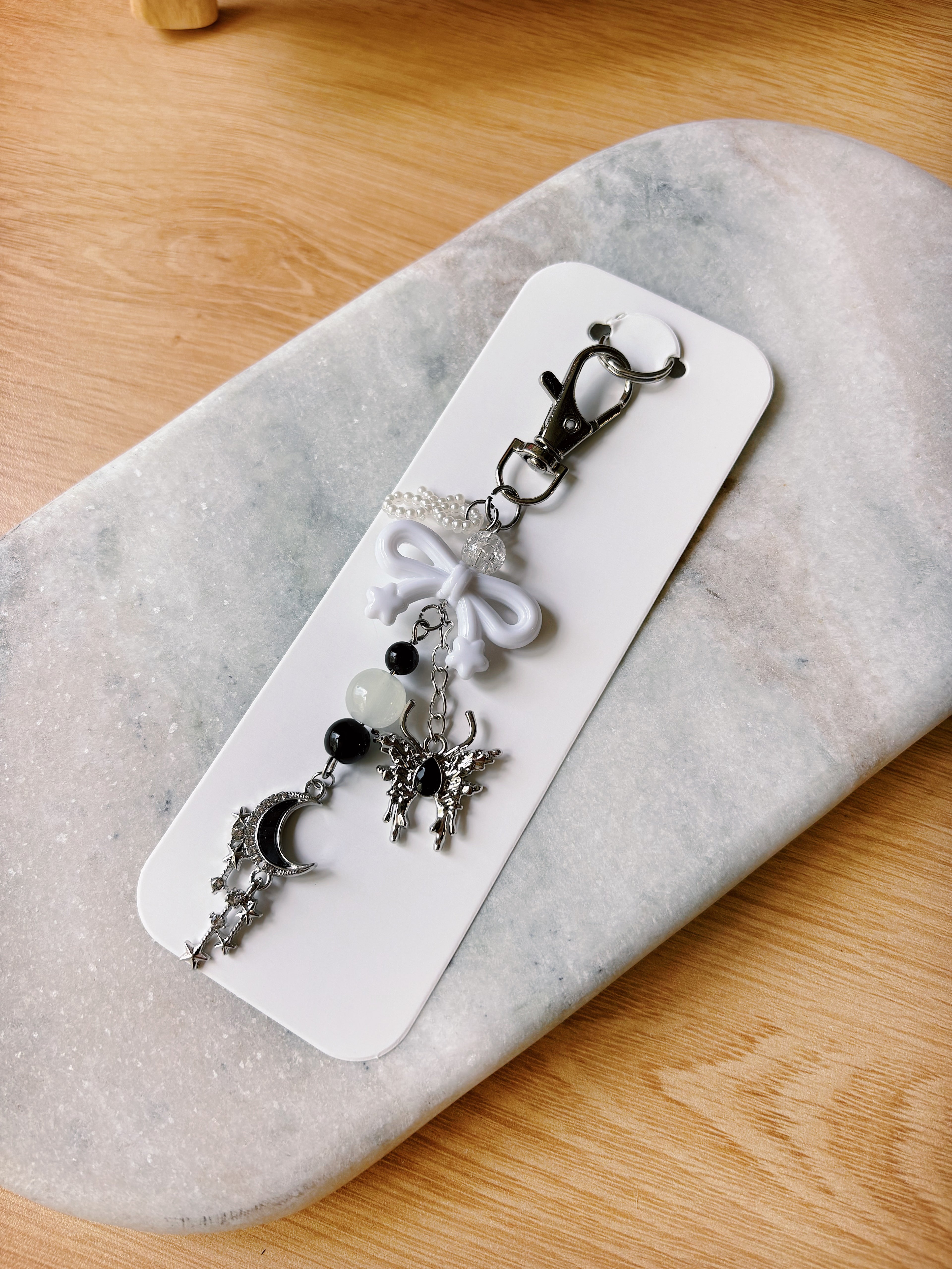 Soft Pixel Diaries Charm — Midnight Angel Keyring (Black & Silver)